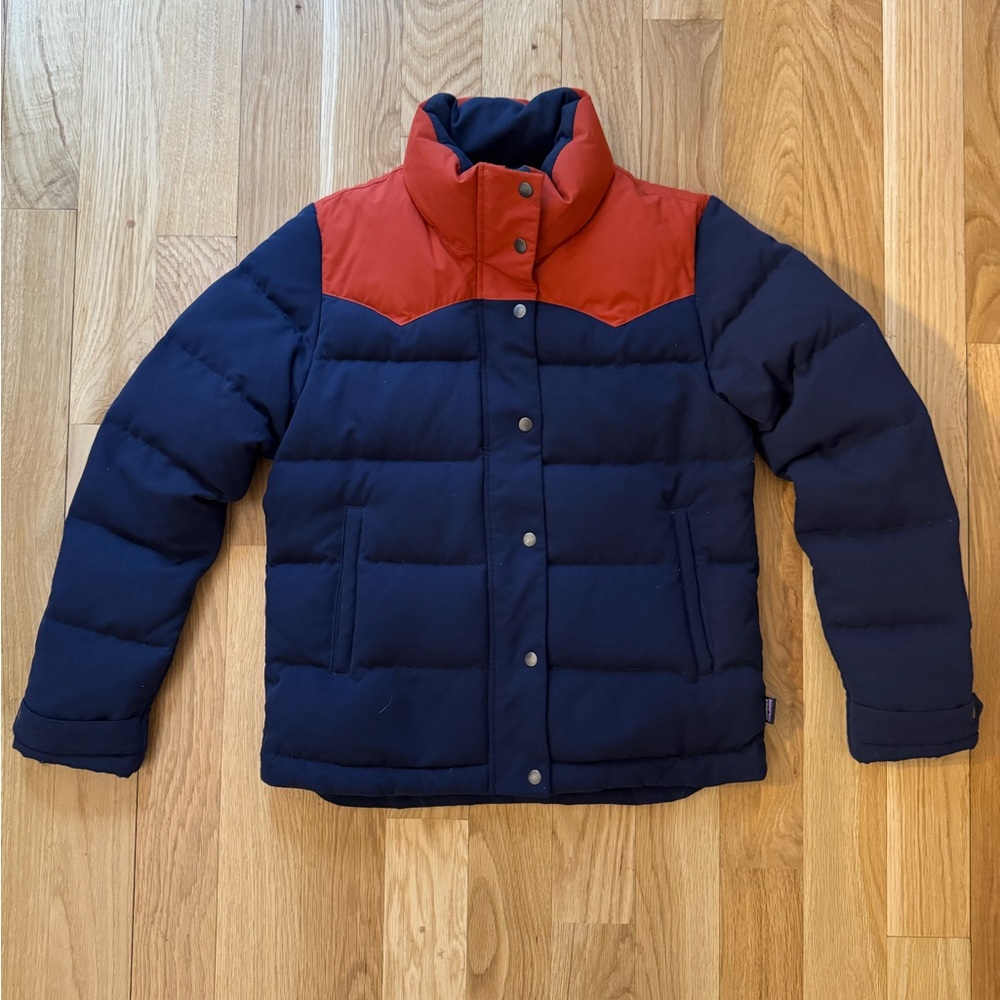 Patagonia women’s bivy down jacket in navy and red. Excellent condition.